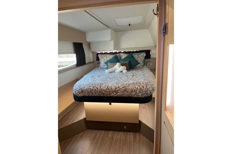 Slide: The Image of Interior cabin of 2018 Fountaine Pajot Helia 44 Evolution with cozy bed and modern decor. - 49