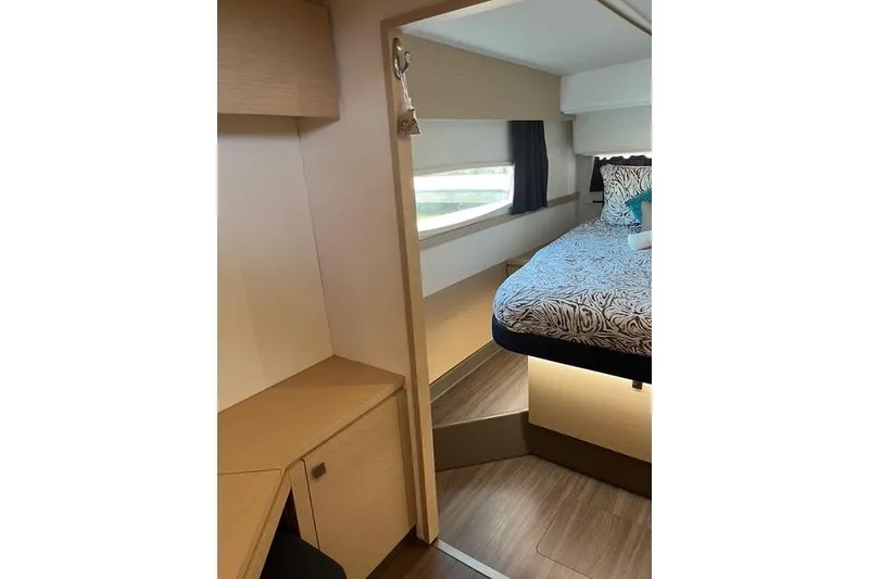 Slide: The Image of Interior of 2018 Fountaine Pajot Helia 44 Evolution yacht cabin with bed and window. - 58