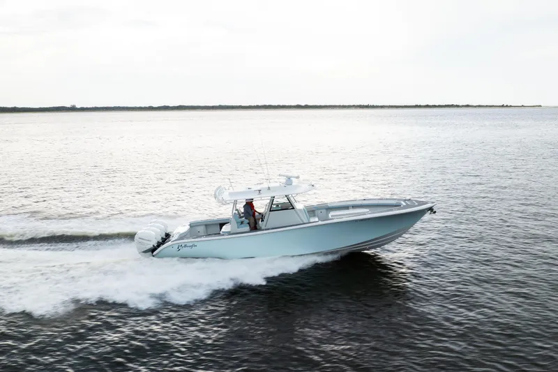 Slide: The Image of 2018 Yellowfin 39 Offshore boat cruising on open water. - 17