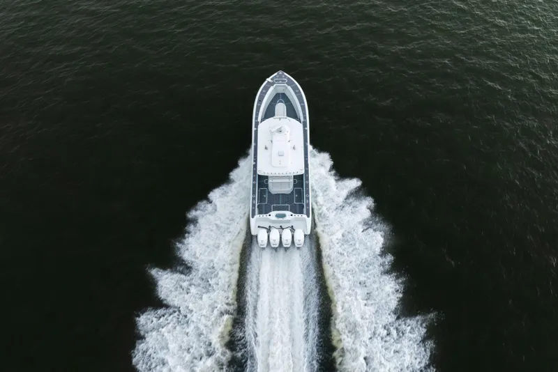 Slide: The Image of Aerial view of 2018 Yellowfin 39 Offshore boat cruising on water. - 24
