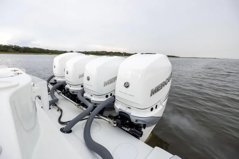 Slide: The Image of 2018 Yellowfin 39 Offshore boat with four Mercury outboard engines on the water. - 34