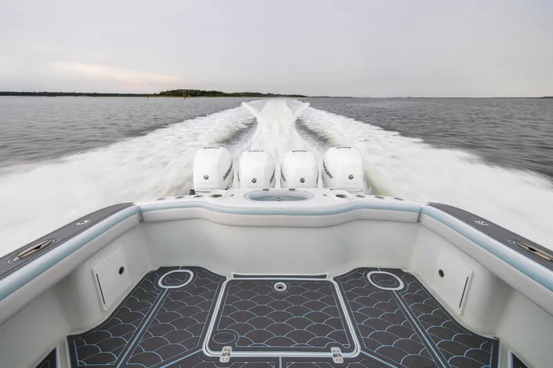 Slide: The Image of 2018 Yellowfin 39 Offshore boat cruising with powerful engines on open water. - 35