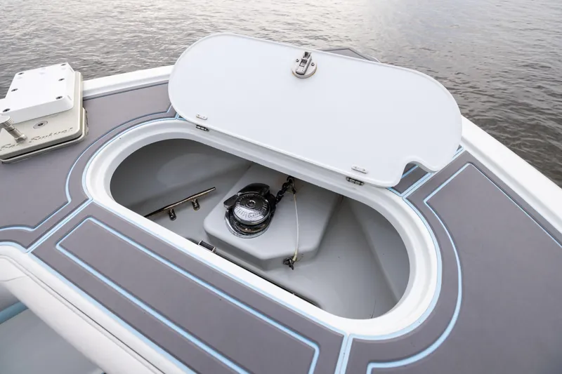 Slide: The Image of 2018 Yellowfin 39 Offshore boat anchor compartment open on deck. - 45