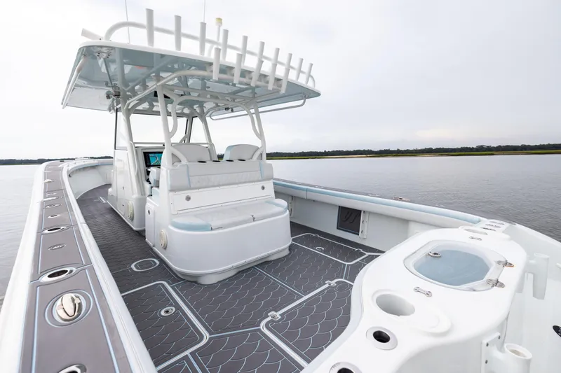 Slide: The Image of 2018 Yellowfin 39 Offshore boat interior with sleek design on calm water. - 69