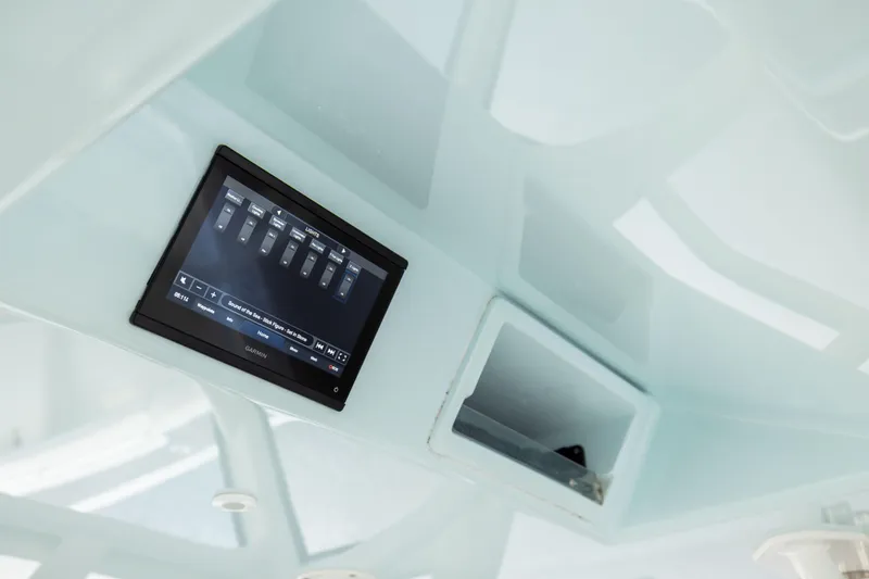 Slide: The Image of Garmin display on 2018 Yellowfin 39 Offshore boat, showing control interface. - 70