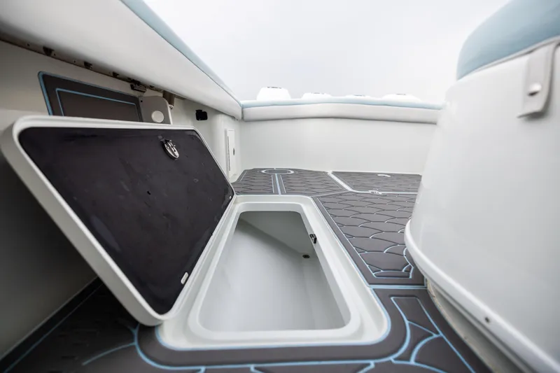 Slide: The Image of 2018 Yellowfin 39 Offshore boat with open storage compartment and sleek deck design. - 78