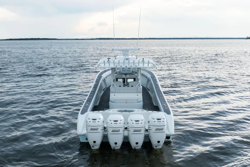 Slide: The Image of 2018 Yellowfin 39 Offshore boat with four powerful engines on open water. - 8