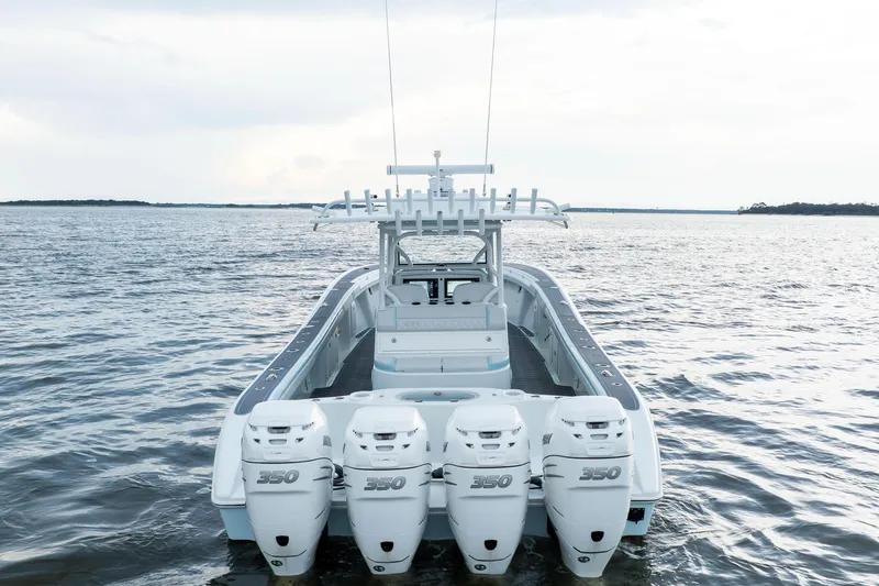 Slide: The Image of 2018 Yellowfin 39 Offshore boat with quad 350 engines on open water. - 9