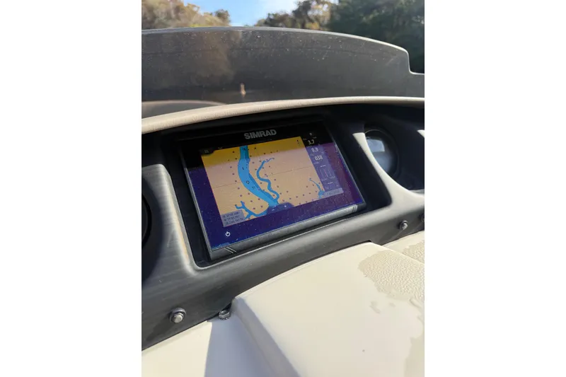 Slide: The Image of Simrad navigation display on 2019 Bennington G 22 GSRFB boat dashboard. - 11