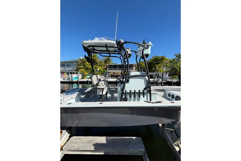 Slide: The Image of 2021 Xplor 24 Andros boat docked, featuring sleek design and modern equipment. - 15