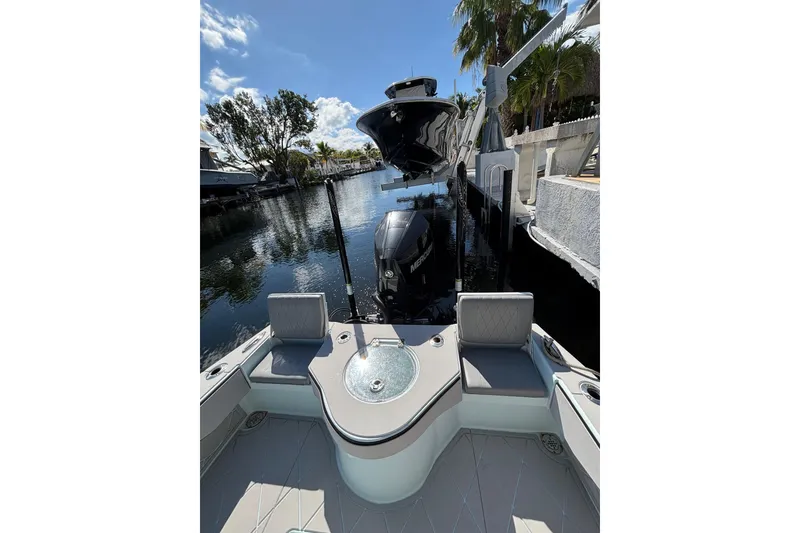 Slide: The Image of 2021 Xplor 24 Andros boat docked in a sunny canal setting. - 17
