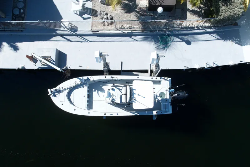 Slide: The Image of Aerial view of 2021 Xplor 24 Andros boat docked at a marina. - 8