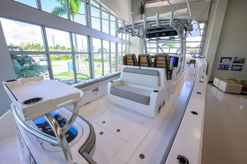Slide: The Image of 2025 Valhalla V-37 boat interior with modern seating and sleek design. - 24