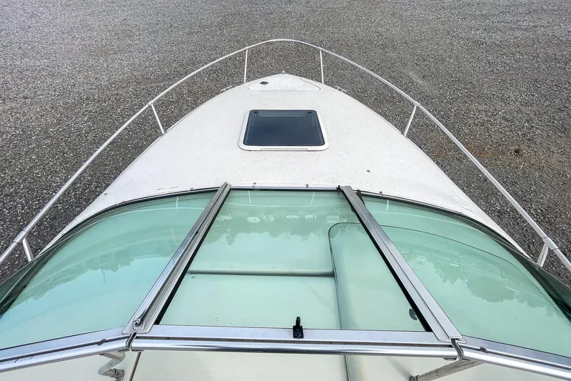 Slide: The Image of Top view of a 1999 Sea Ray 215 Express Cruiser boat, showing the bow and windshield. - 17