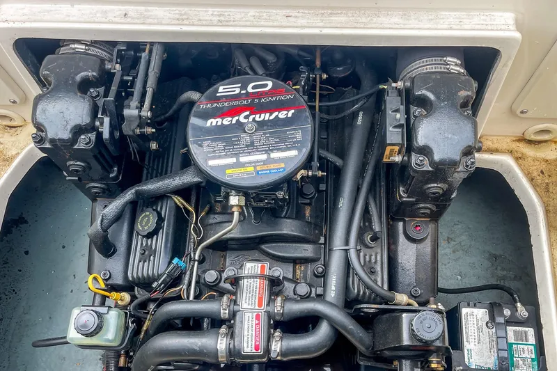 Slide: The Image of Engine compartment of a 1999 Sea Ray 215 Express Cruiser with MerCruiser 5.0L engine. - 30