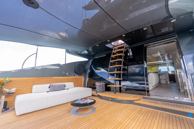 Slide: The Image of Luxurious Palmer Johnson 120 yacht interior, featuring elegant seating and modern design, built in 2003. - 10