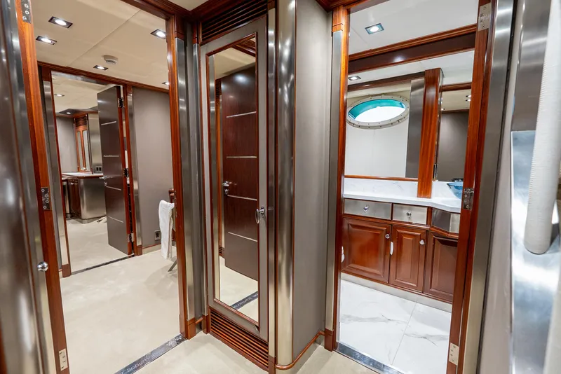 Slide: The Image of Luxurious interior of 2003 Palmer Johnson 120 yacht, featuring elegant wood finishes and modern design. - 20