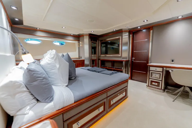 Slide: The Image of Luxurious bedroom interior of 2003 Palmer Johnson 120 yacht with elegant wood finishes and modern decor. - 23