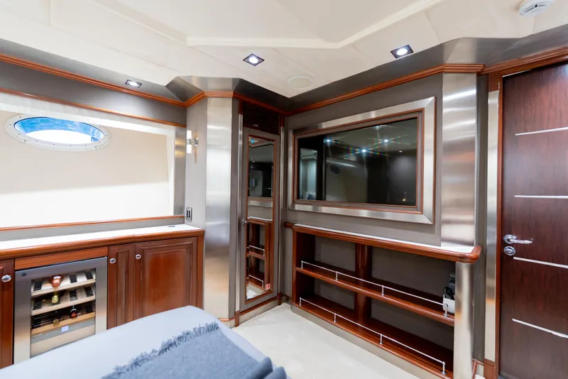 Slide: The Image of Luxurious interior of a 2003 Palmer Johnson 120 yacht with elegant wood and metal finishes. - 25