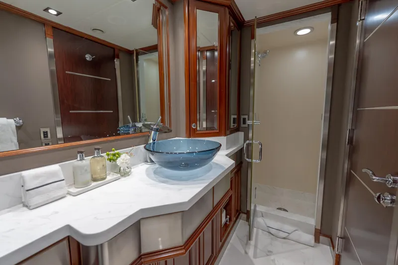 Slide: The Image of Luxurious yacht bathroom with glass sink and shower, Palmer Johnson 120, 2003 model. - 31
