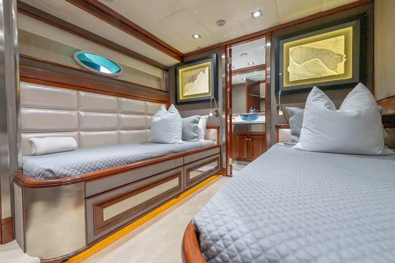 Slide: The Image of Luxurious interior of 2003 Palmer Johnson 120 yacht with elegant twin beds and modern decor. - 32