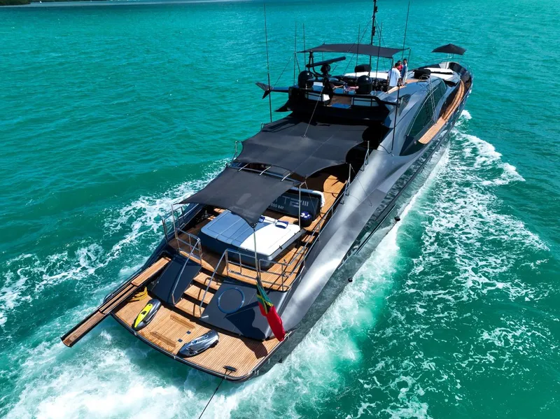 Slide: The Image of Luxurious 2003 Palmer Johnson 120 yacht cruising on turquoise waters. - 34