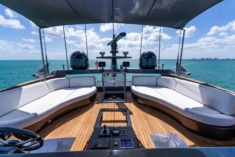 Slide: The Image of Luxurious Palmer Johnson 120 yacht deck with elegant seating, ocean view, and modern amenities, 2003 model. - 35