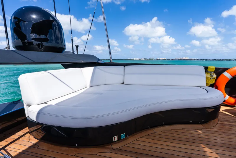 Slide: The Image of Luxurious deck seating on 2003 Palmer Johnson 120 yacht, with ocean view and clear skies. - 39