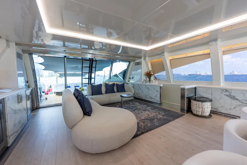 Slide: The Image of Luxurious interior of 2003 Palmer Johnson 120 yacht with modern furnishings and panoramic windows. - 6