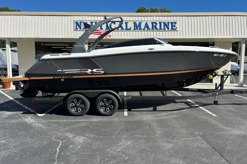 Slide: The Image of 2022 Four Winns H260 RS boat on trailer at Nautical Marine dealership. - 23