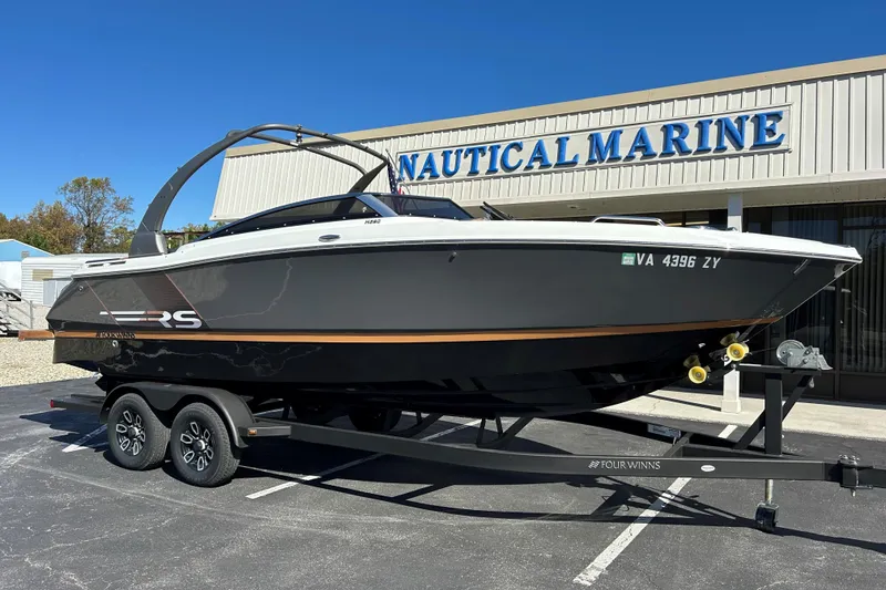 Slide: The Image of 2022 Four Winns H260 RS boat on trailer at Nautical Marine dealership. - 24