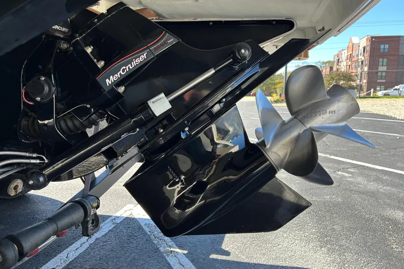 Slide: The Image of 2022 Four Winns H260 RS boat with MerCruiser Bravo Three outdrive and dual propellers. - 5