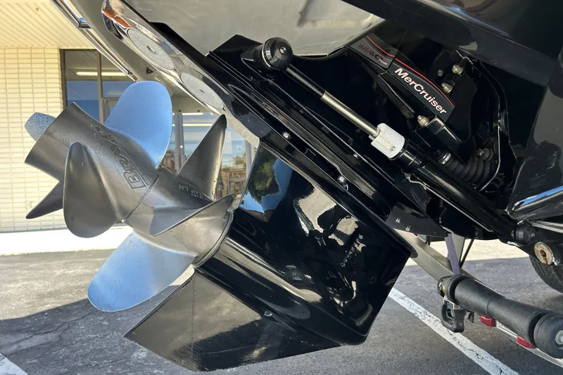 Slide: The Image of Close-up of 2022 Four Winns H260 RS boat propeller and MerCruiser engine. - 7