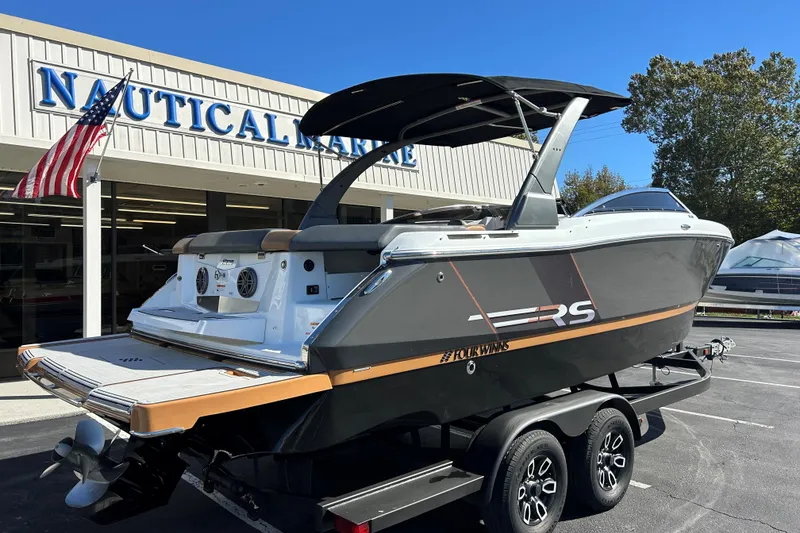 Slide: The Image of 2022 Four Winns H260 RS boat on trailer outside Nautical Marine dealership. - 8