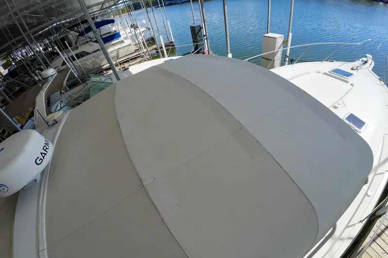 Slide: The Image of 1999 Tiara Yachts 3500 Express docked in marina, overhead view. - 136