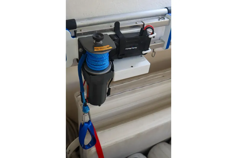 Slide: The Image of Electric winch with blue rope on a 1999 Tiara Yachts 3500 Express. - 145