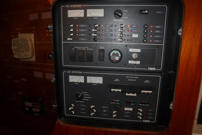 Slide: The Image of Electrical control panel on a 1999 Tiara Yachts 3500 Express boat. - 168