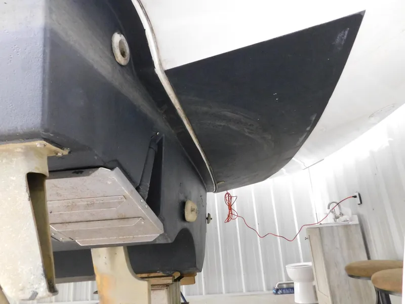 Slide: The Image of 1999 Tiara Yachts 3500 Express hull in storage, showcasing underside details. - 46