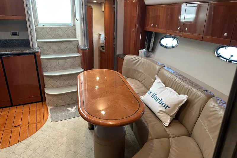 Slide: The Image of Luxurious interior of 2004 Formula 48 Yacht with elegant wood finishes and plush seating. - 17