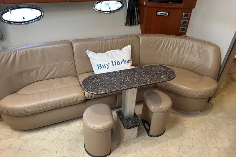 Slide: The Image of Luxurious interior of 2004 Formula 48 Yacht with leather seating and elegant table. - 18