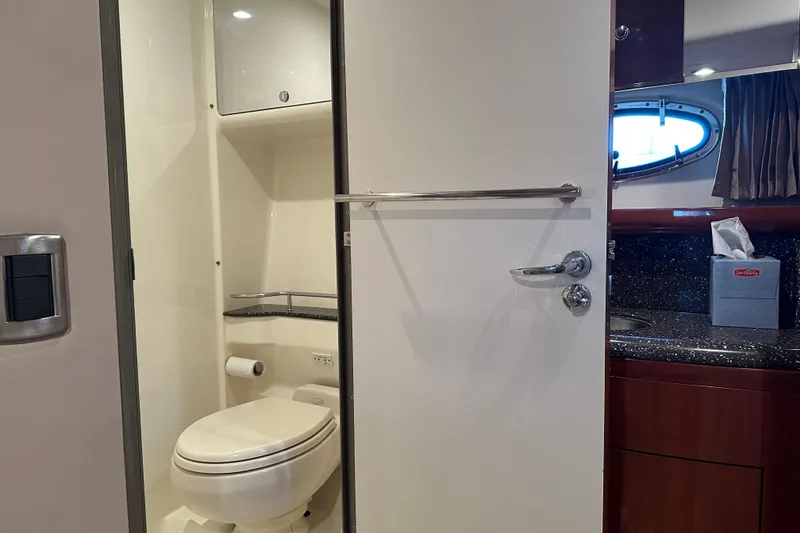 Slide: The Image of 2004 Formula 48 Yacht bathroom interior with modern fixtures and elegant design. - 27
