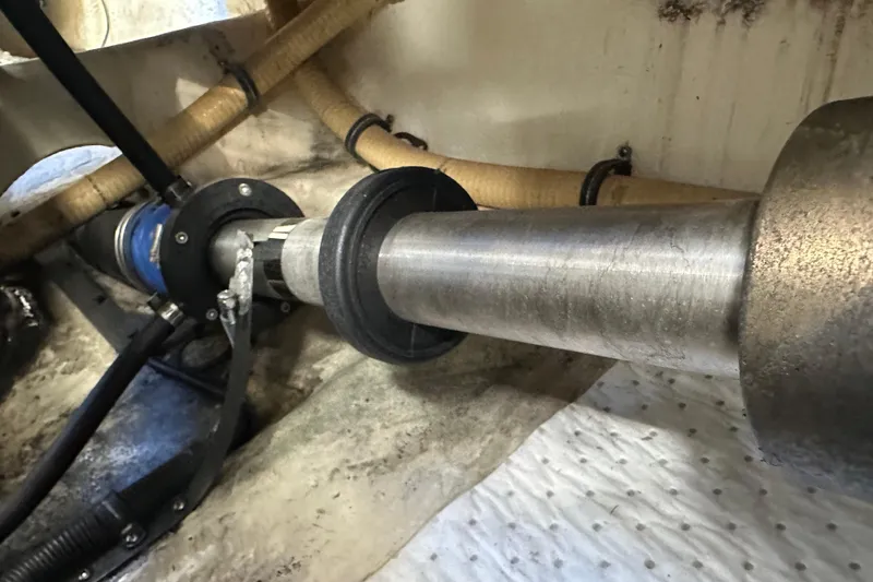 Slide: The Image of Engine room detail of a 2004 Formula 48 Yacht, showcasing mechanical components. - 62