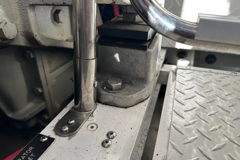 Slide: The Image of Close-up of 2004 Formula 48 Yacht engine compartment with metal components and diamond plate flooring. - 72