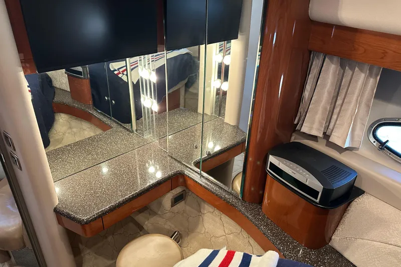 Slide: The Image of Luxurious interior of a 2004 Formula 48 Yacht with mirrored vanity and modern decor. - 8