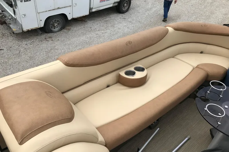 Slide: The Image of Luxurious seating on 2019 Avalon Catalina VRL 25' pontoon boat with cup holders. - 14