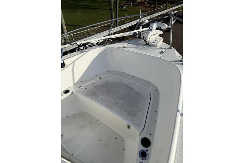 Slide: The Image of 2001 Boston Whaler 230 Outrage boat deck with clean, spacious layout. - 5