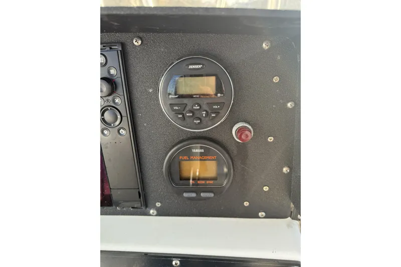 Slide: The Image of Dashboard of a 2001 Boston Whaler 230 Outrage with Yamaha fuel management system. - 6