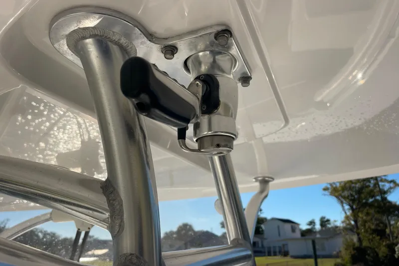 Slide: The Image of Close-up of a 2018 Southport 33 FE boat's metal fixture under a clear sky. - 15