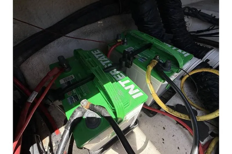 Slide: The Image of Two Interstate batteries in a 2007 Chaparral 236 SSX boat engine compartment. - 7