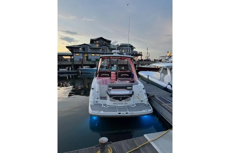 Slide: The Image of 2021 Monterey 335 Sport Yacht docked at marina during sunset. - 1